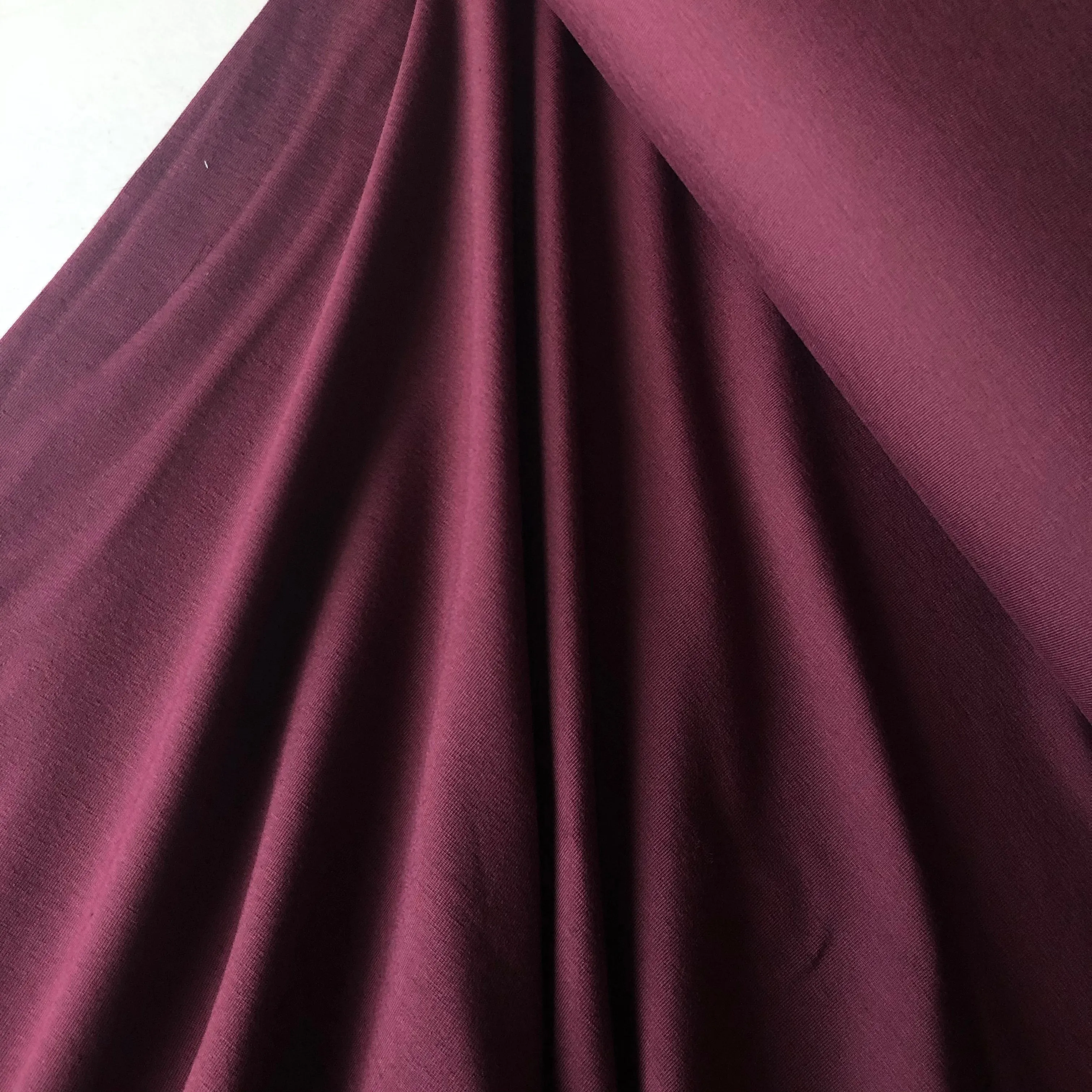 Essential Chic Aubergine Plain Cotton Jersey Fabric WITH FAULT (pull lines at every 4cm)