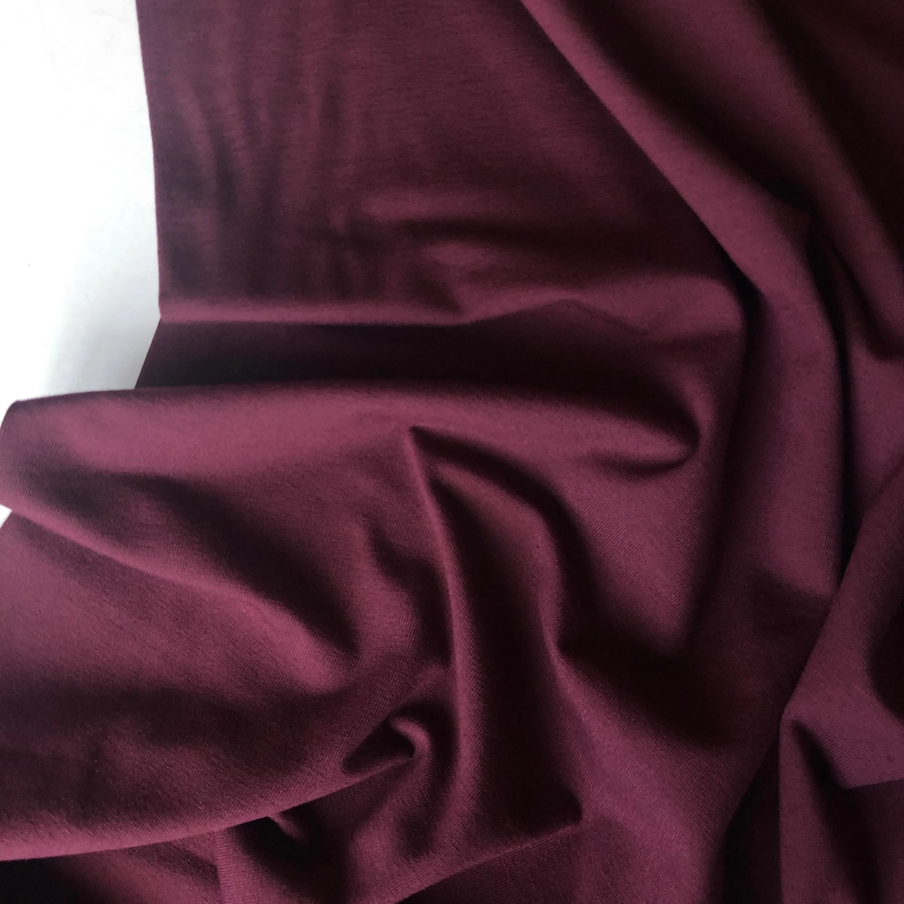 Essential Chic Aubergine Plain Cotton Jersey Fabric WITH FAULT (pull lines at every 4cm)