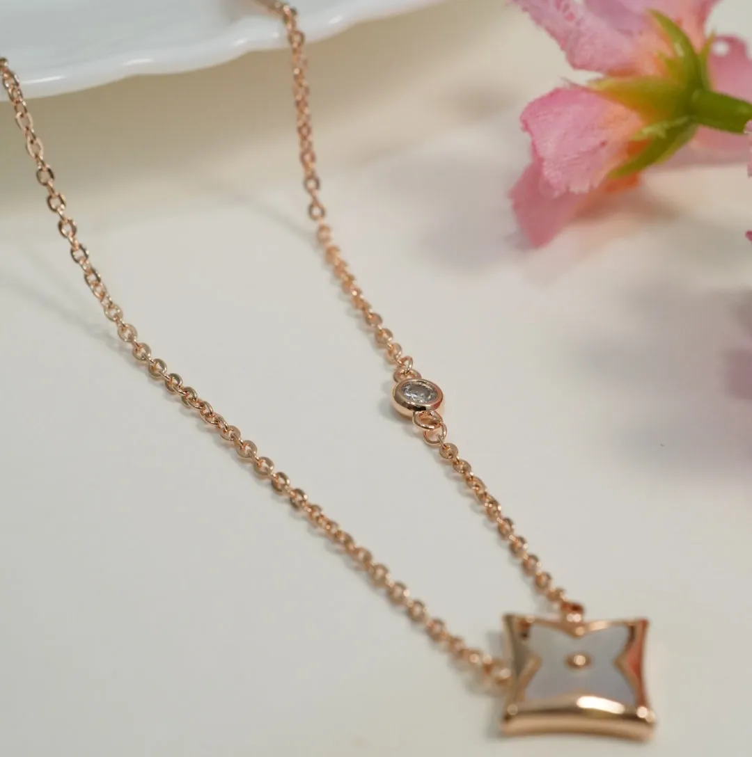 Sophisticated Zirconia Studded Floral Mother of Pearl Rose Gold Plated Chain Pendant Necklace